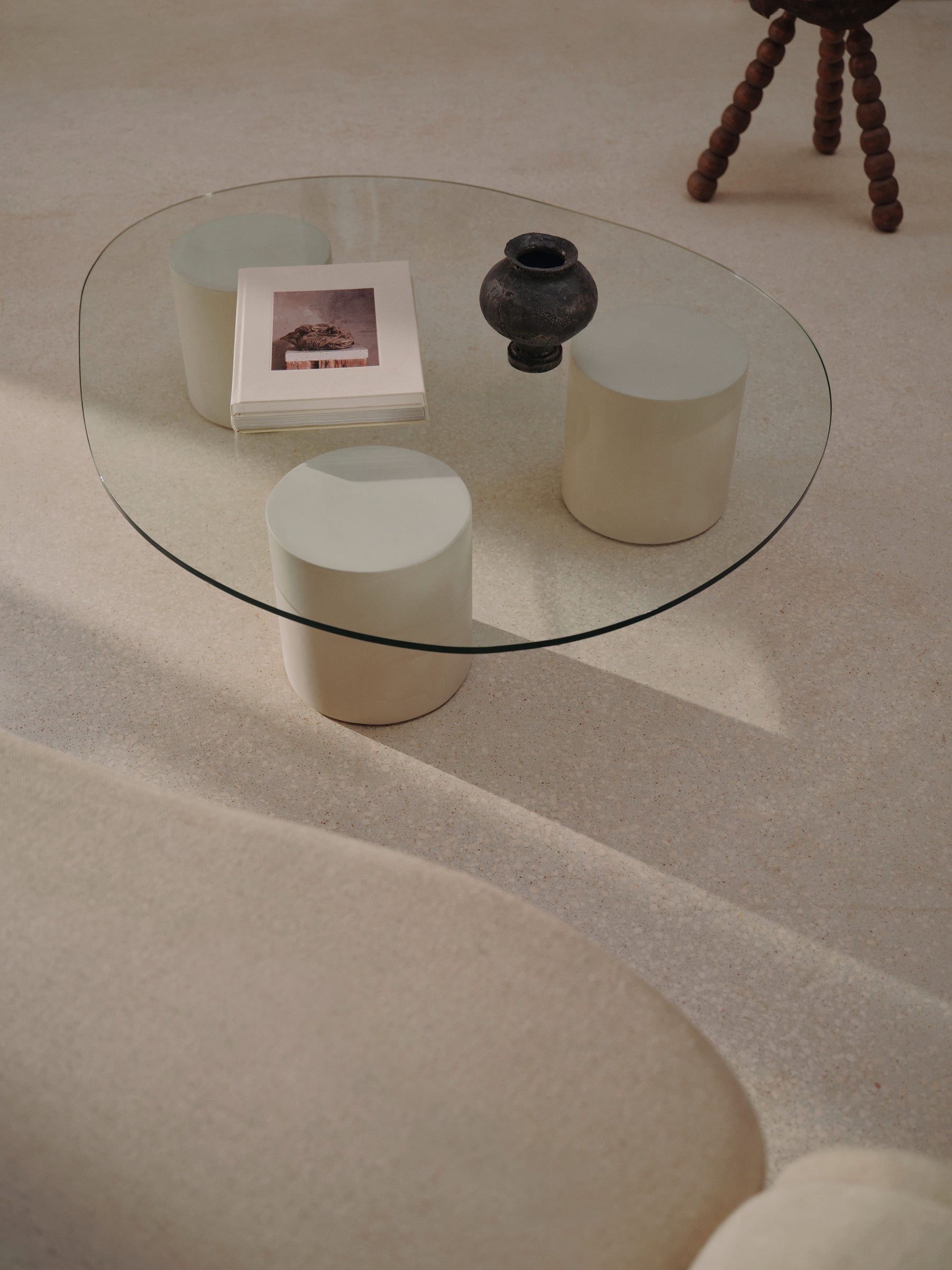 Coffee table — glass and linen
