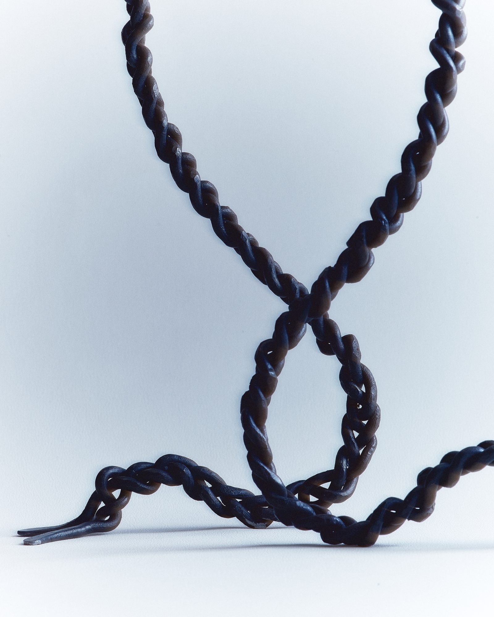 Detail — braided iron knot