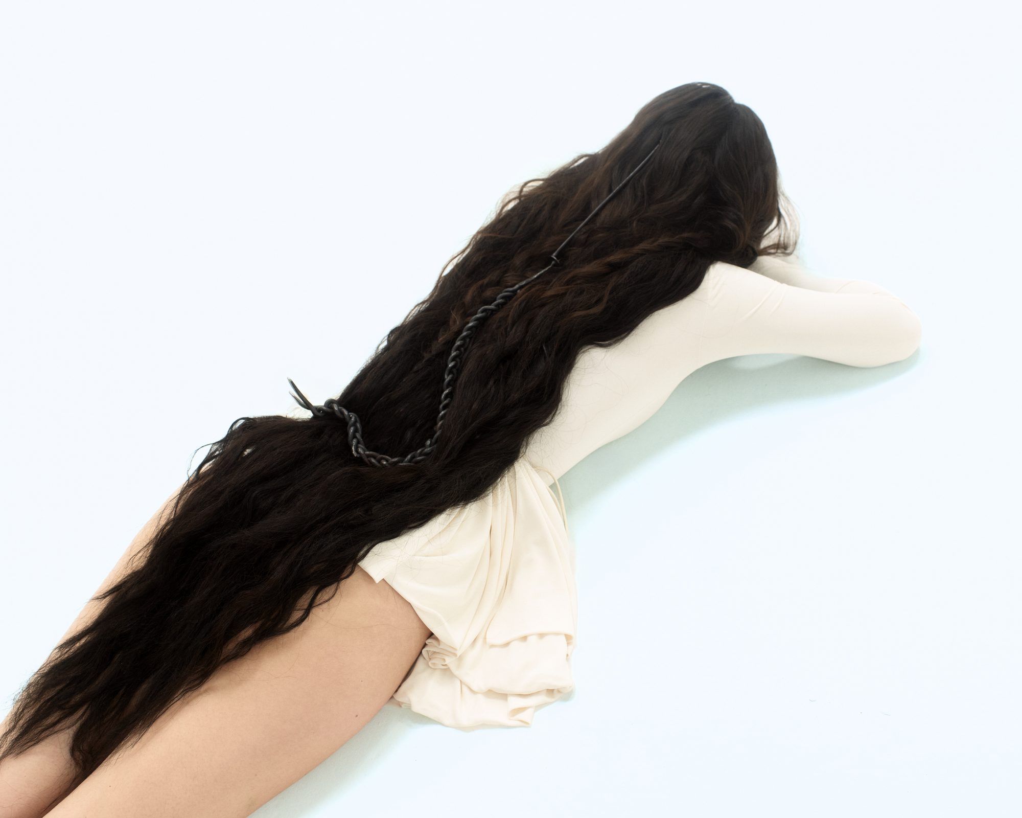 Editorial — braided iron thread woven through hair