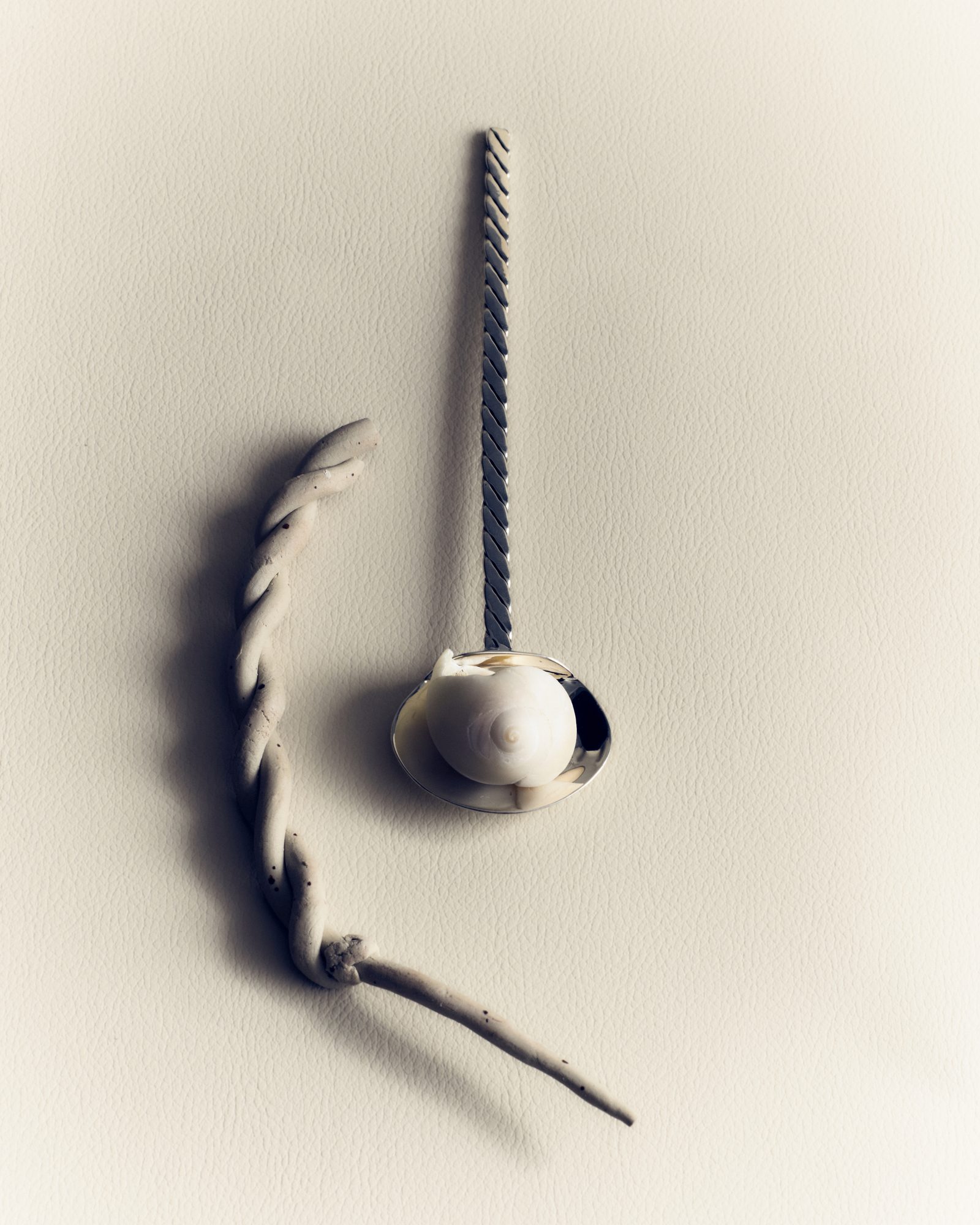 Silver ladle and twisted serving piece