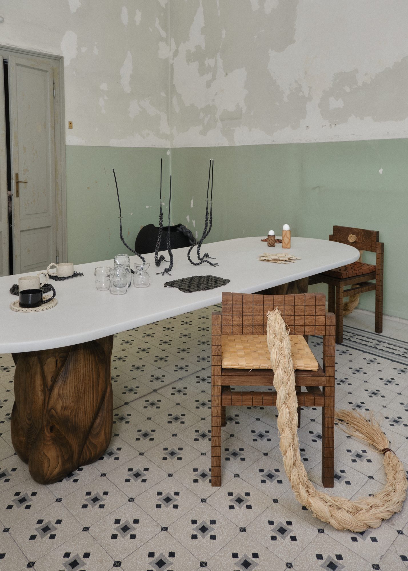 The dining table set with artisan pieces and Trenzar chair